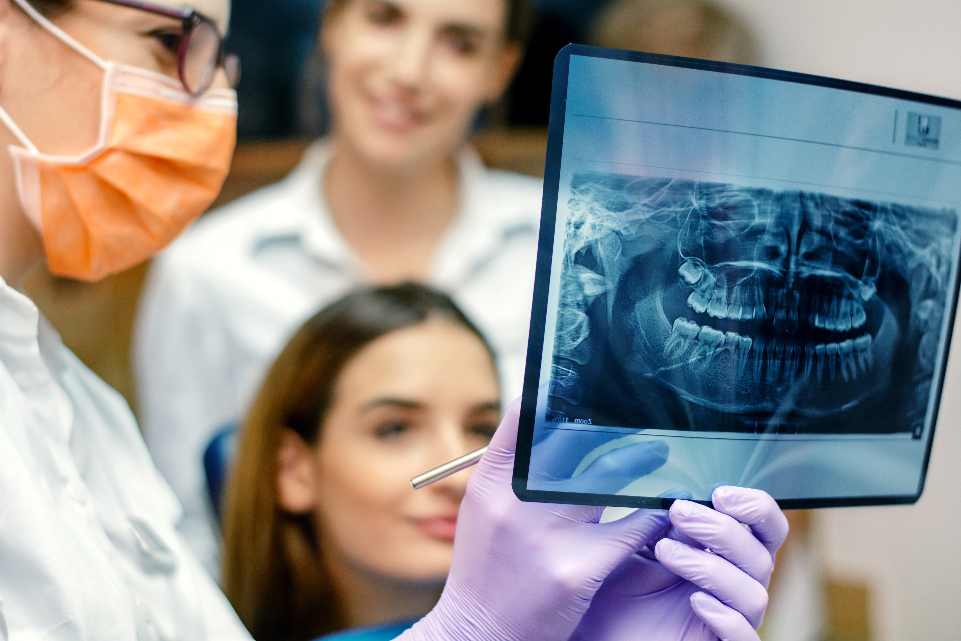 Woman sharing healthy smile after dental checkup and teeth cleaning